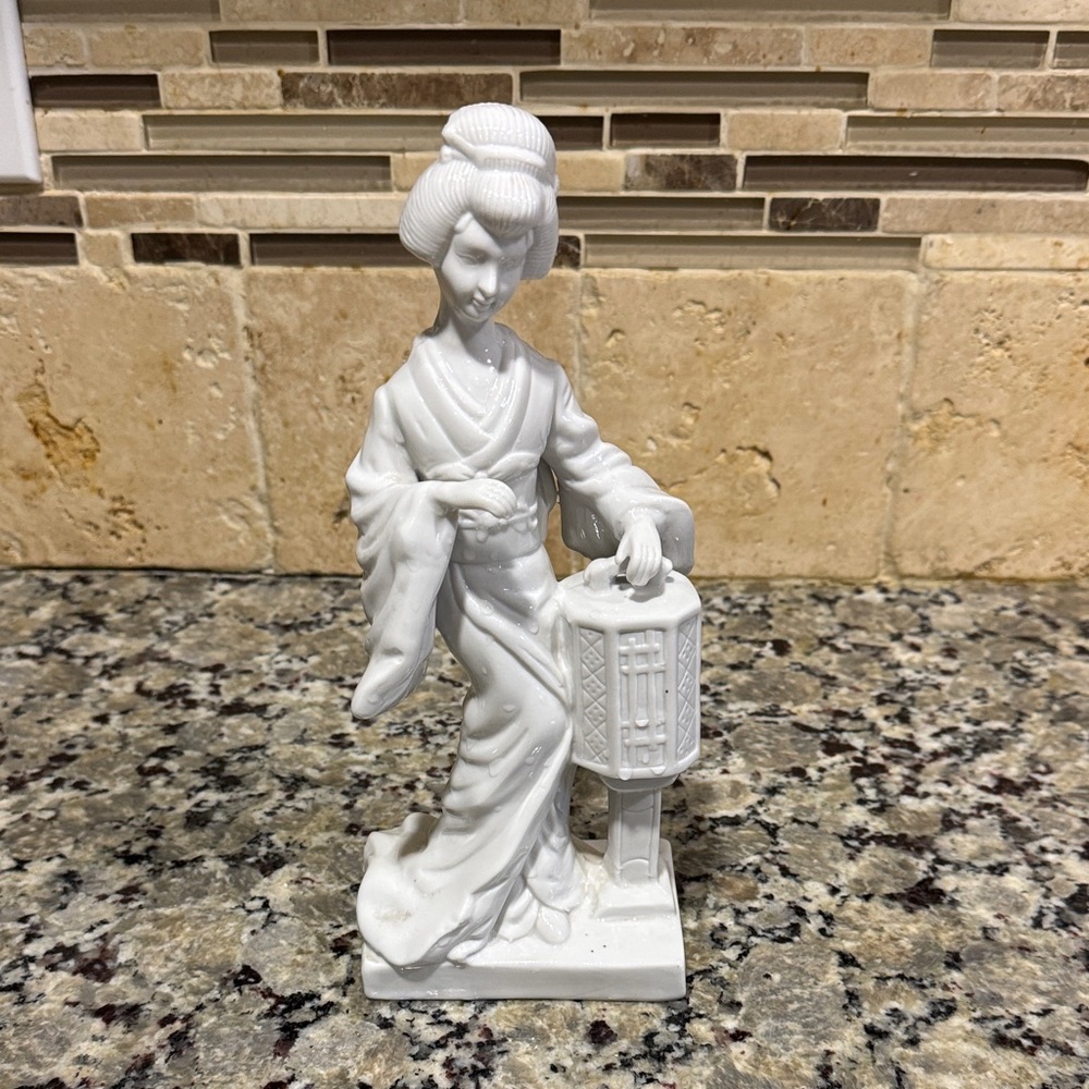 Elegant White Porcelain Figurine